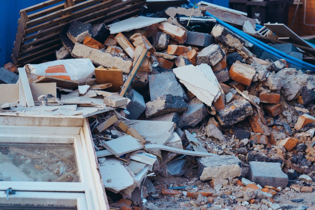Construction debris including bricks, drywall, and wood ready for junk removal in Philadelphia