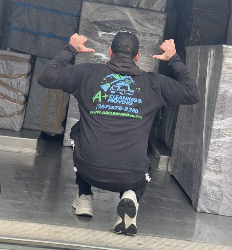 Professional movers loading furniture in during a local residential move