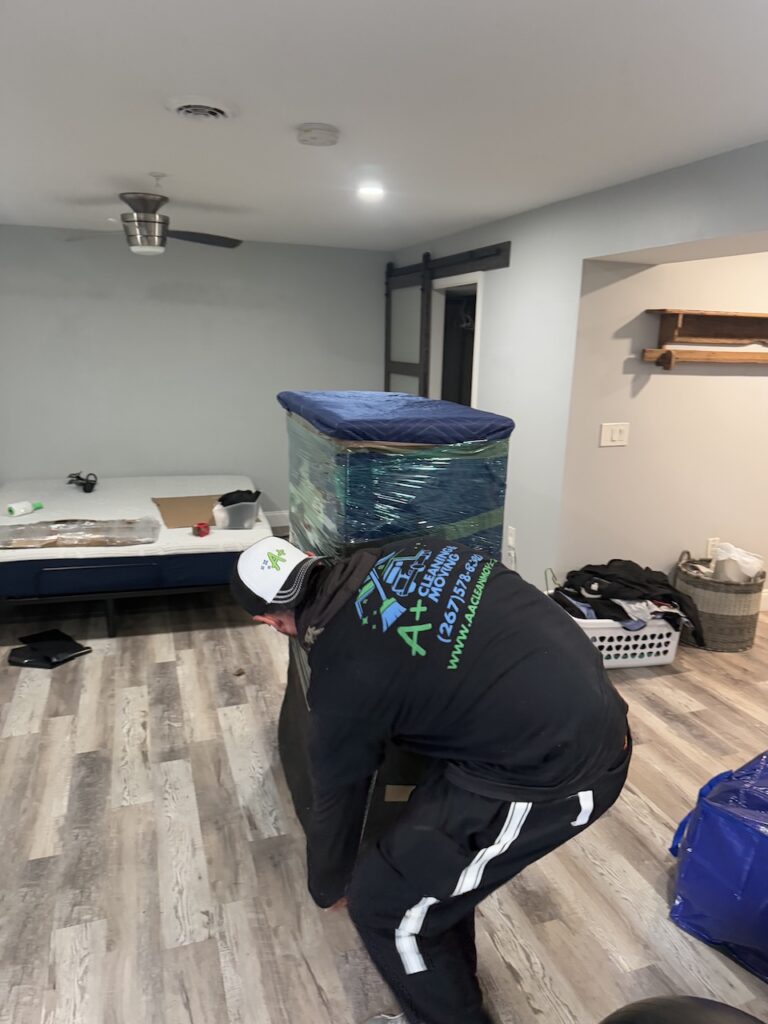 Chester County movers loading furniture into a moving truck during a residential relocation.